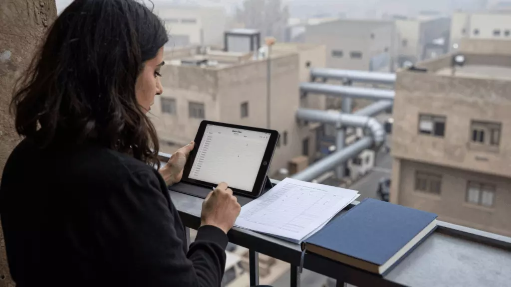 an Arab man in his early 30s working through استقرار