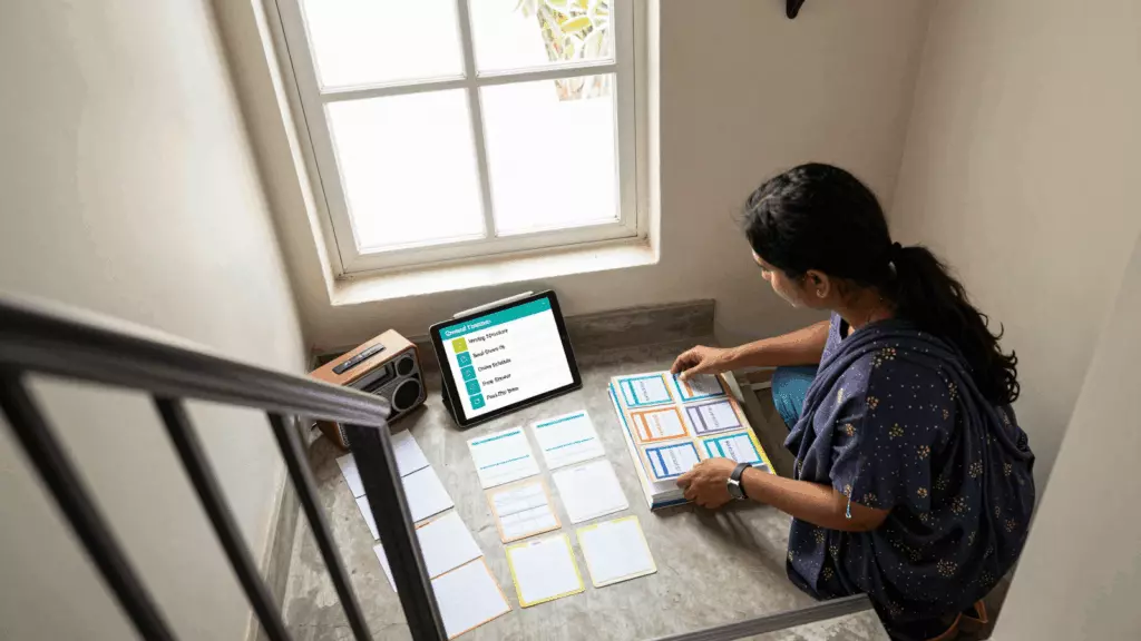 a Bangladeshi woman in her late 20s working through বাছাই করুন