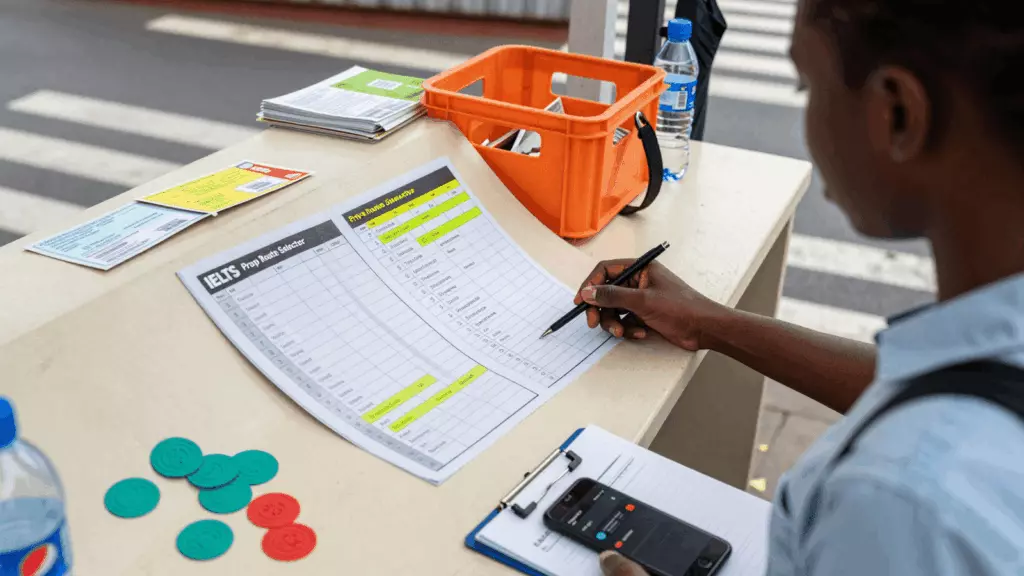 a Nigerian woman in her late 20s working through Route
