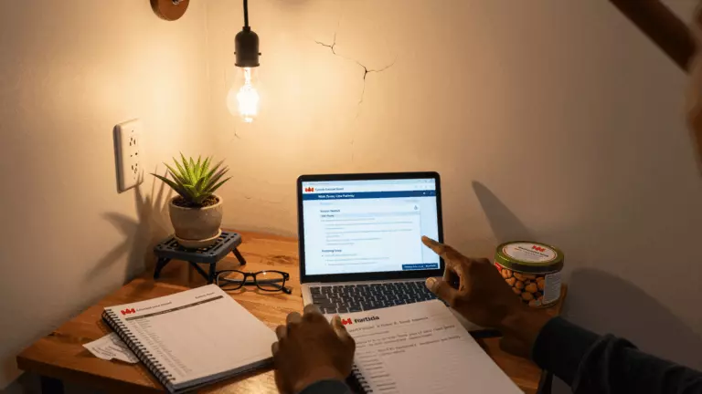 a Nigerian man in his late 20s planning for Canada preparing online for IELTS for Canada From Nigeria: Prep Plan, Writing Help, and Practice Tests