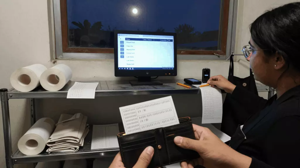an Arab man in his early 30s reviewing an IELTS online course workflow