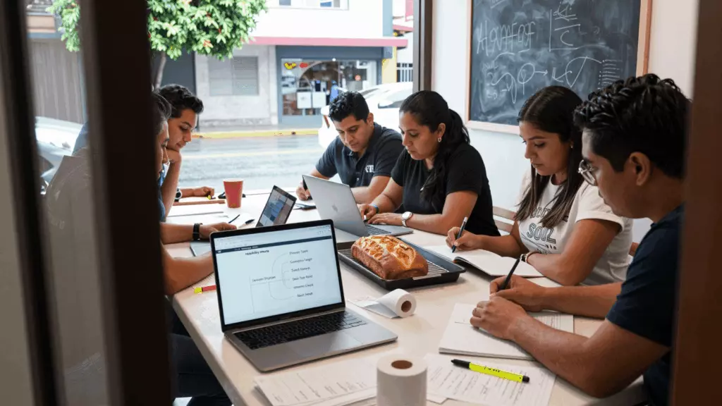 a Latina woman in her late 20s reviewing an IELTS online course workflow