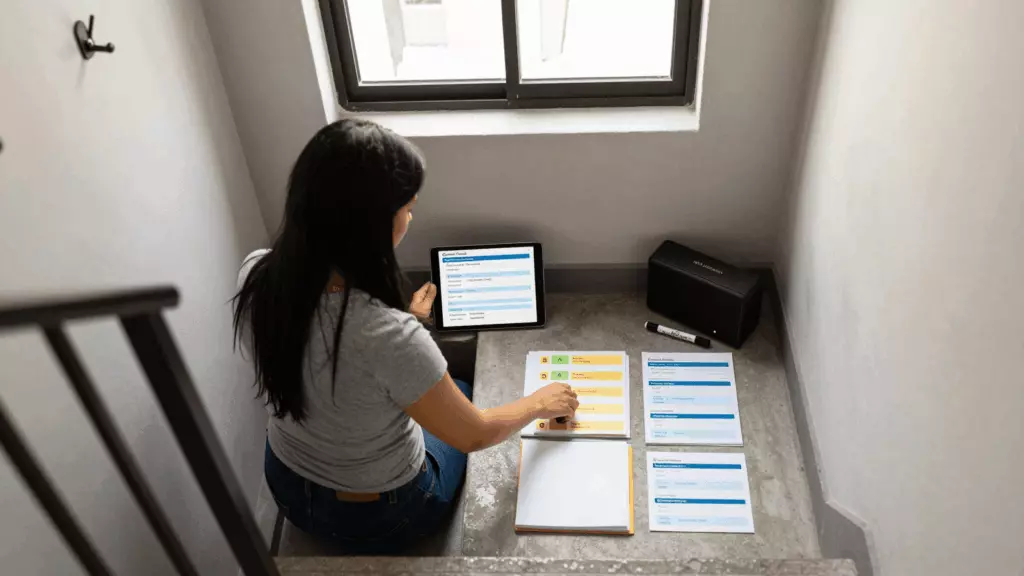 a Latina woman in her late 20s working through Elija