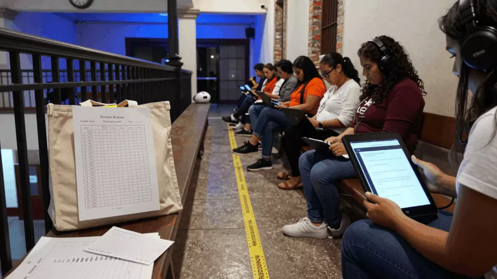 a Latina woman in her late 20s working through Simular
