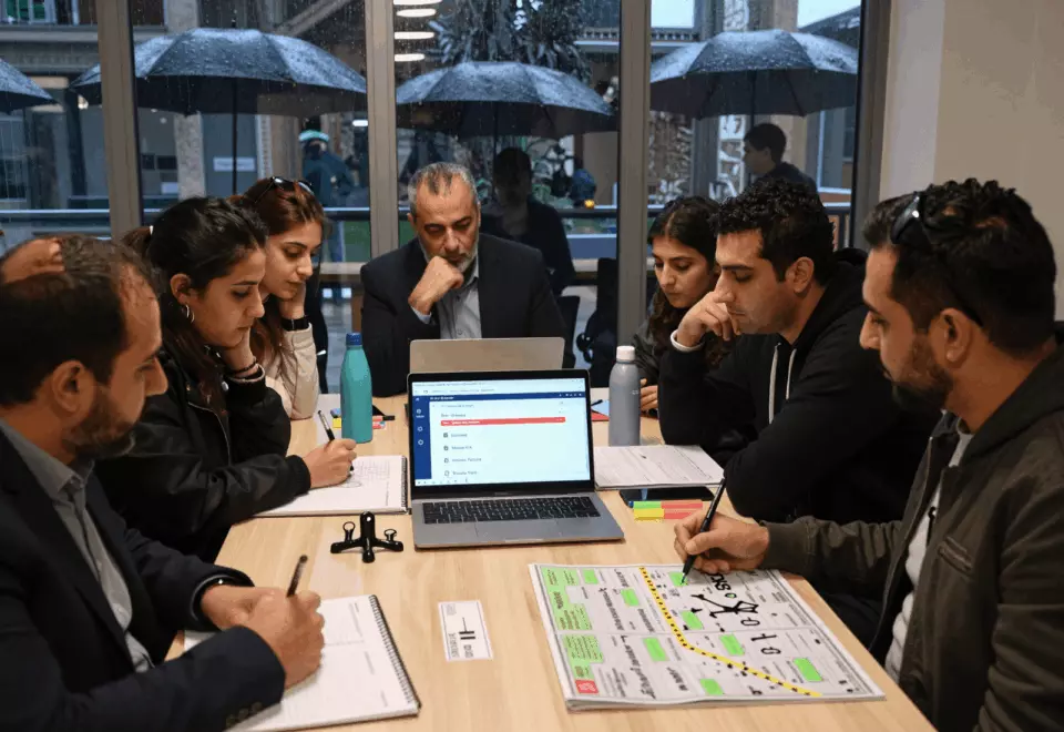a Persian woman in her late 20s choosing the next IELTS prep step online