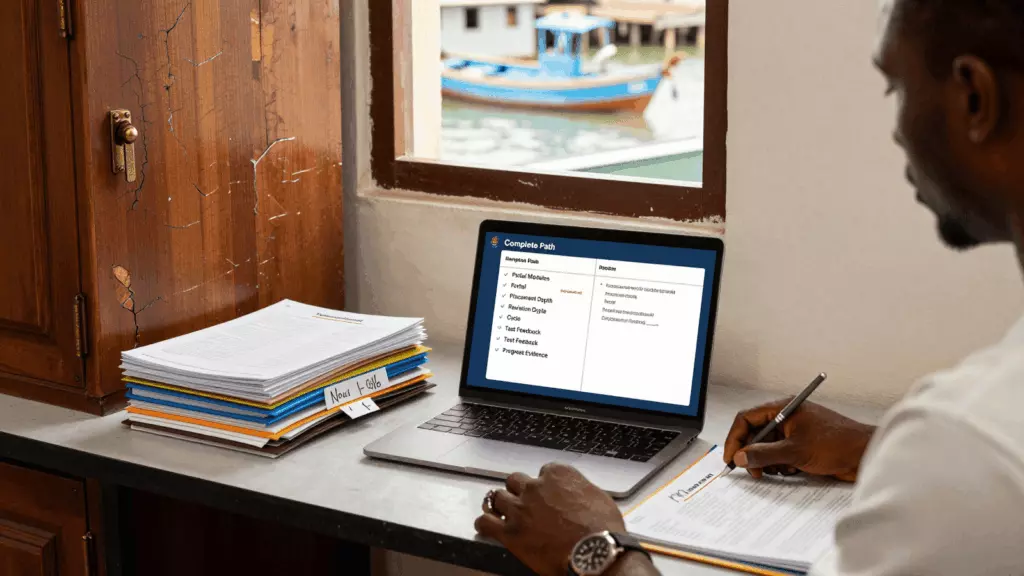 a Francophone African man in his late 20s working through Comparez