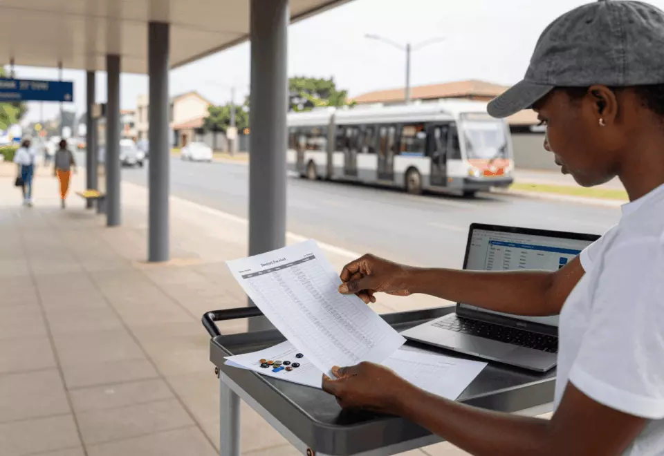 a Francophone African man in his late 20s choosing the next IELTS prep step online