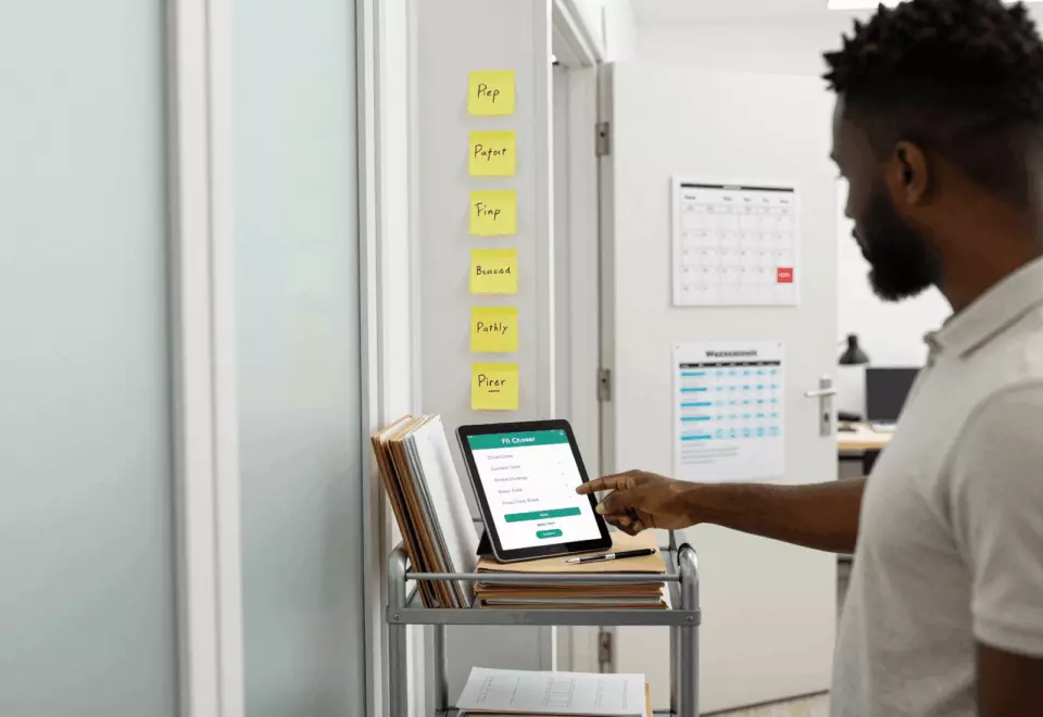 a Francophone African man in his late 20s choosing the next IELTS prep step online