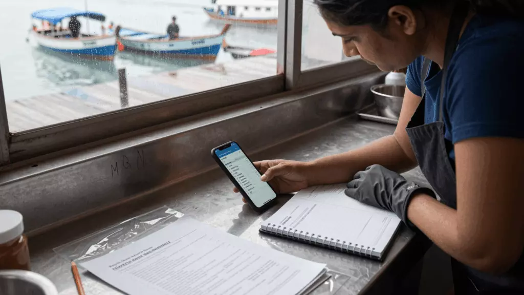 an Indian woman in her late 20s working through जांचें