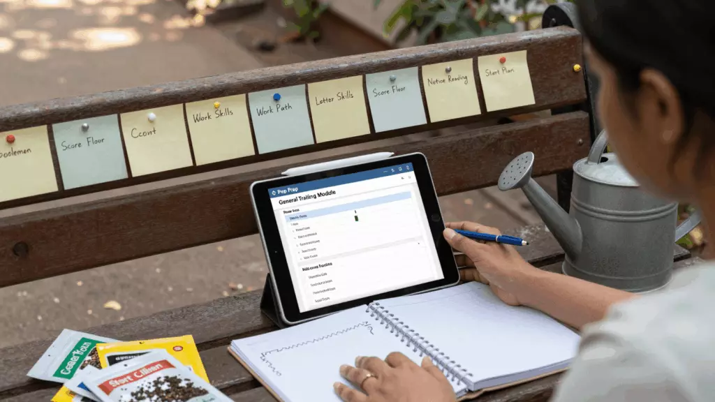 an Indian woman in her late 20s reviewing an IELTS online course workflow