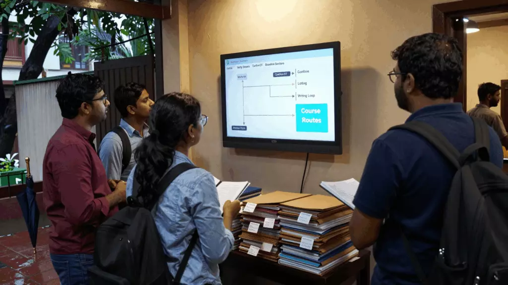 an Indian woman in her late 20s reviewing an IELTS online course workflow