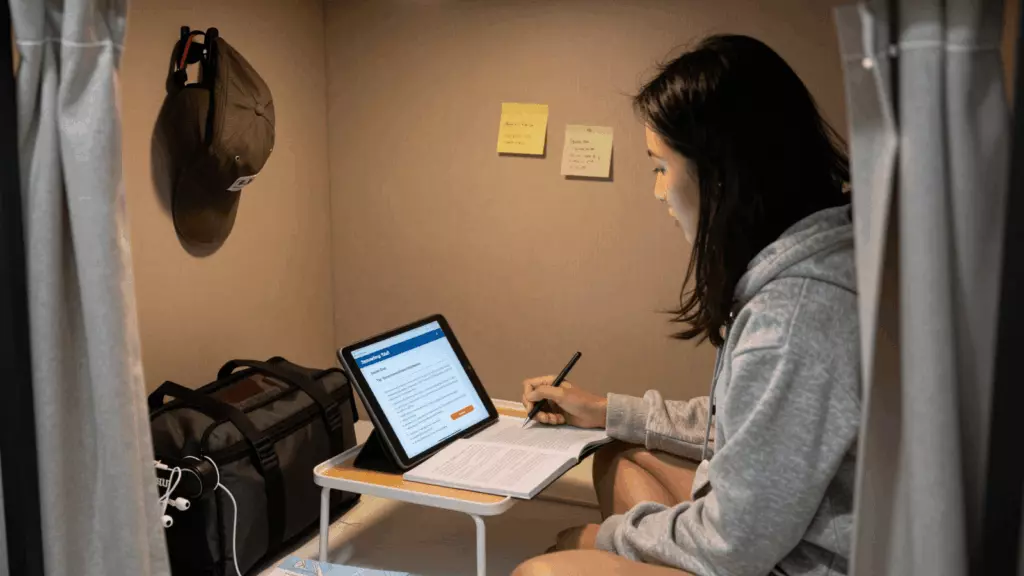 an Indonesian woman in her late 20s working through Belajar