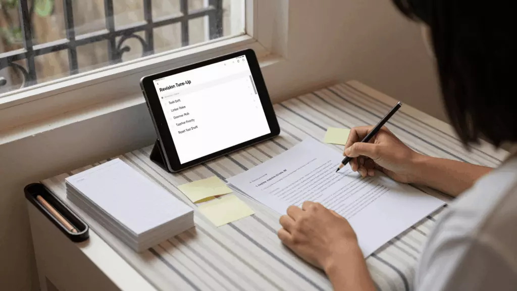 an Indonesian woman in her late 20s working through Revisi