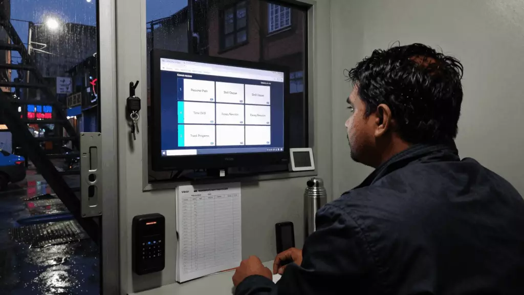 a Nepali woman in her late 20s reviewing an IELTS online course workflow