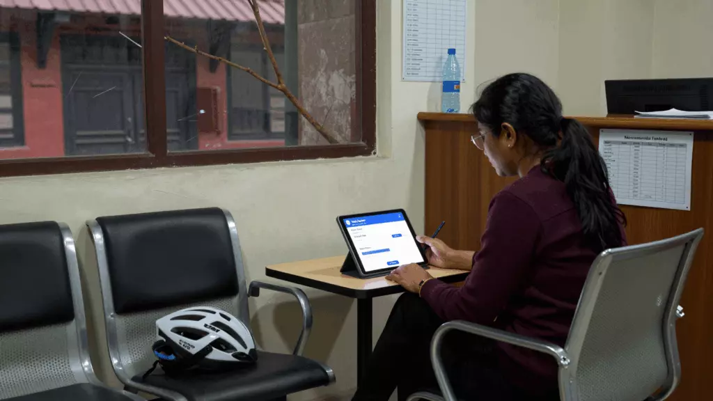 a Nepali woman in her late 20s working through सिमुलेट