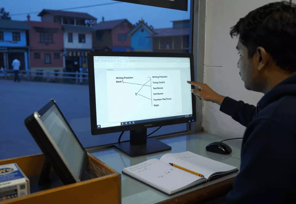 a Nepali woman in her late 20s choosing the next IELTS prep step online
