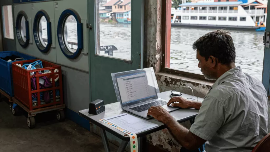 a Nepali woman in her late 20s working through अभ्यास