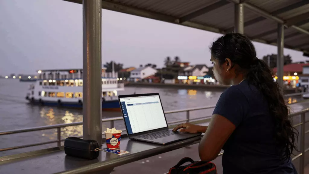 a Tamil woman in her late 20s working through தீர்மானிக்கவும்