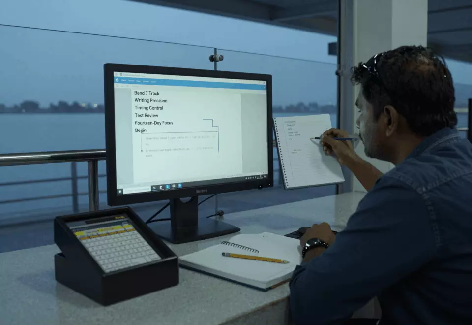 a Tamil woman in her late 20s choosing the next IELTS prep step online