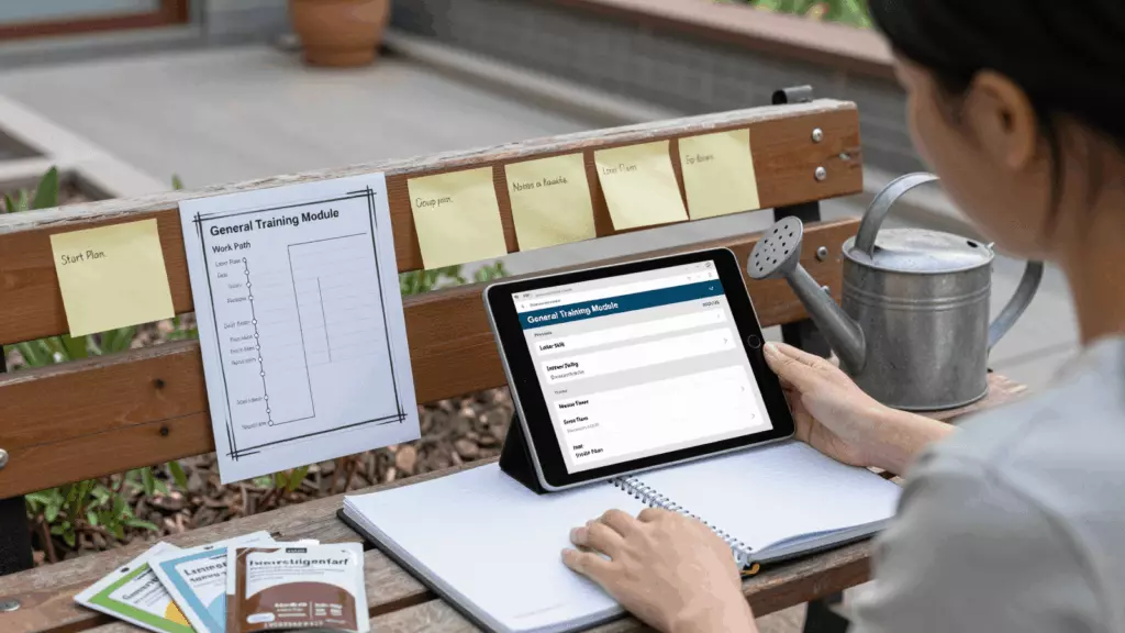 a Chinese woman in her late 20s reviewing an IELTS online course workflow